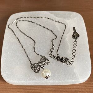 Elegant Silver Bow Pendant Necklace